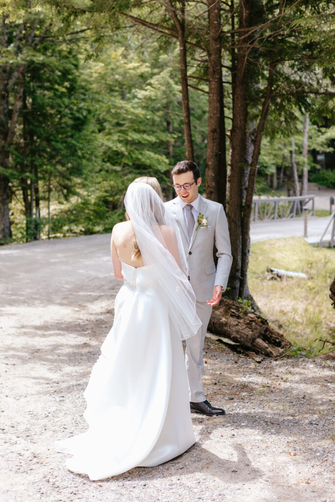 Bride and groom have first look lakeside at their Muskoka wedding.