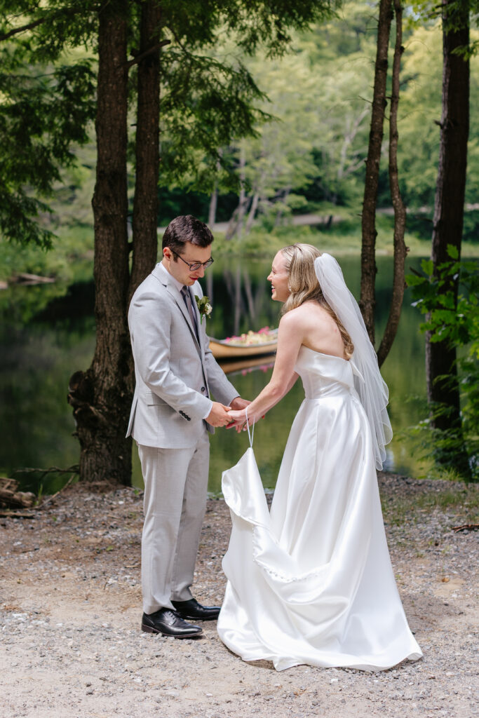 Bride and groom have first look lakeside at their Muskoka wedding.