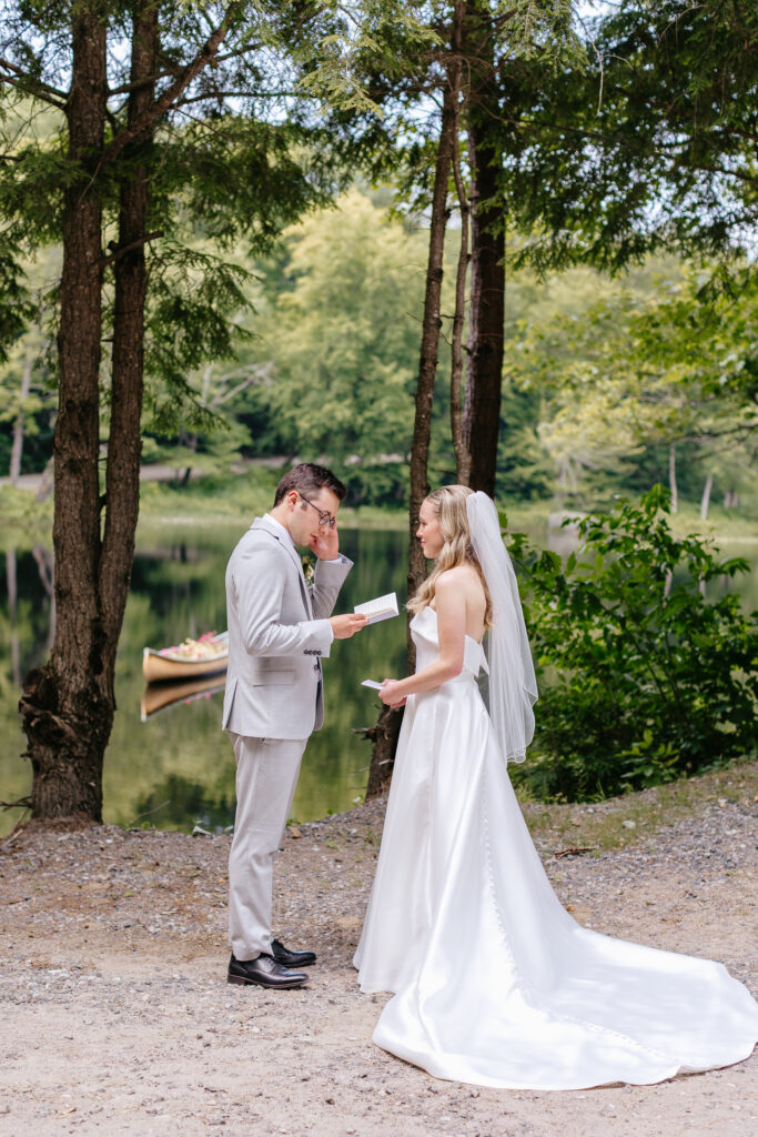 Bride and groom have first look lakeside at their Muskoka wedding.