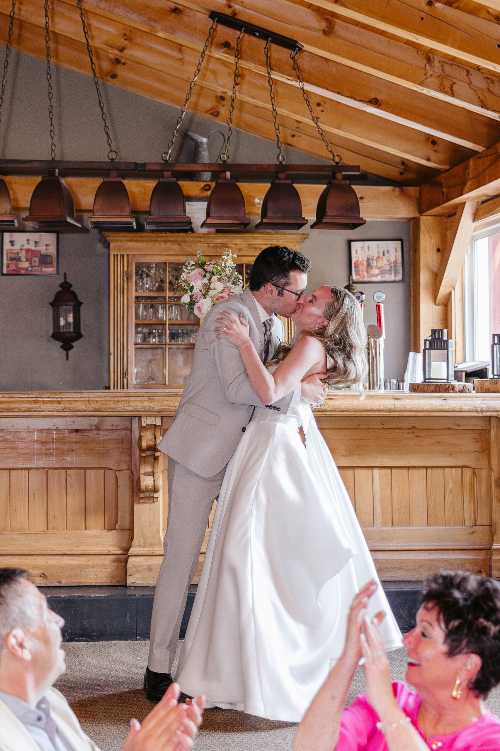 Lakeside wedding ceremony with bride and groom at Trillium Resort and Spa in Muskoka Ontario