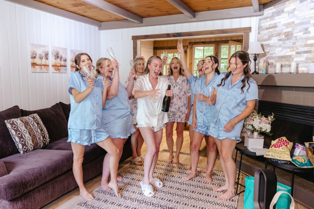 Bride getting ready with bridesmaids for Muskoka Wedding.